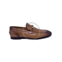 Brown leather loafer shoe on a white background