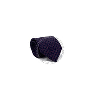 Navy blue tie with geometric pattern on a white background