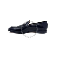 Black loafer shoe on a white background