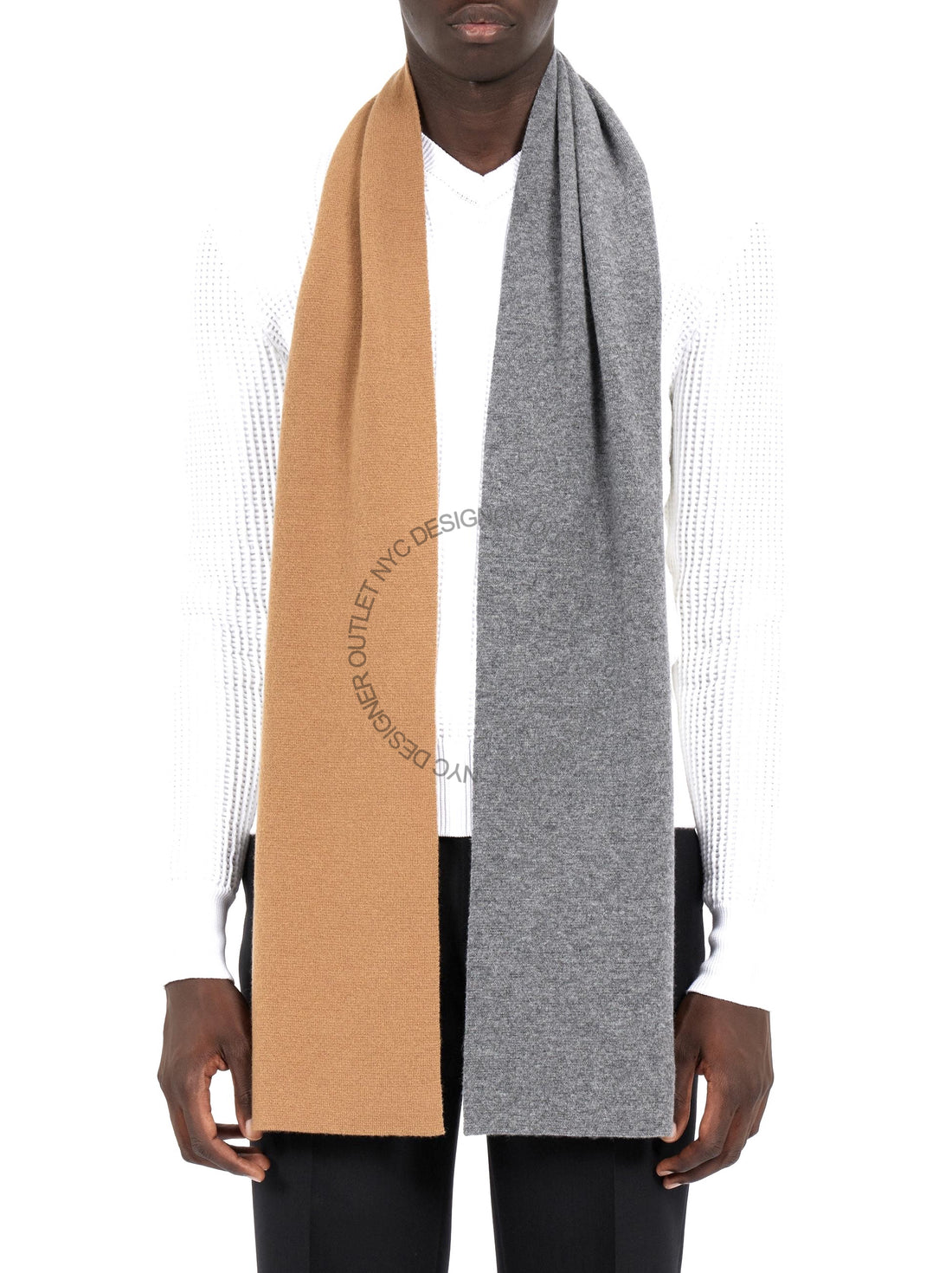 Person wearing a brown and gray scarf