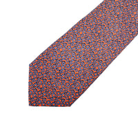 Orange Patterned tie with blue circles on an white background